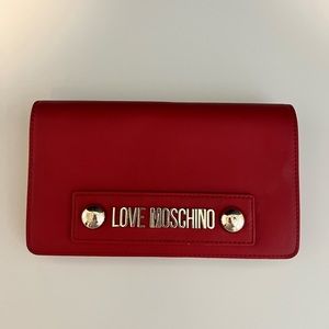 LOVE MOSCHINO Red purse. Comes with original dust bag.